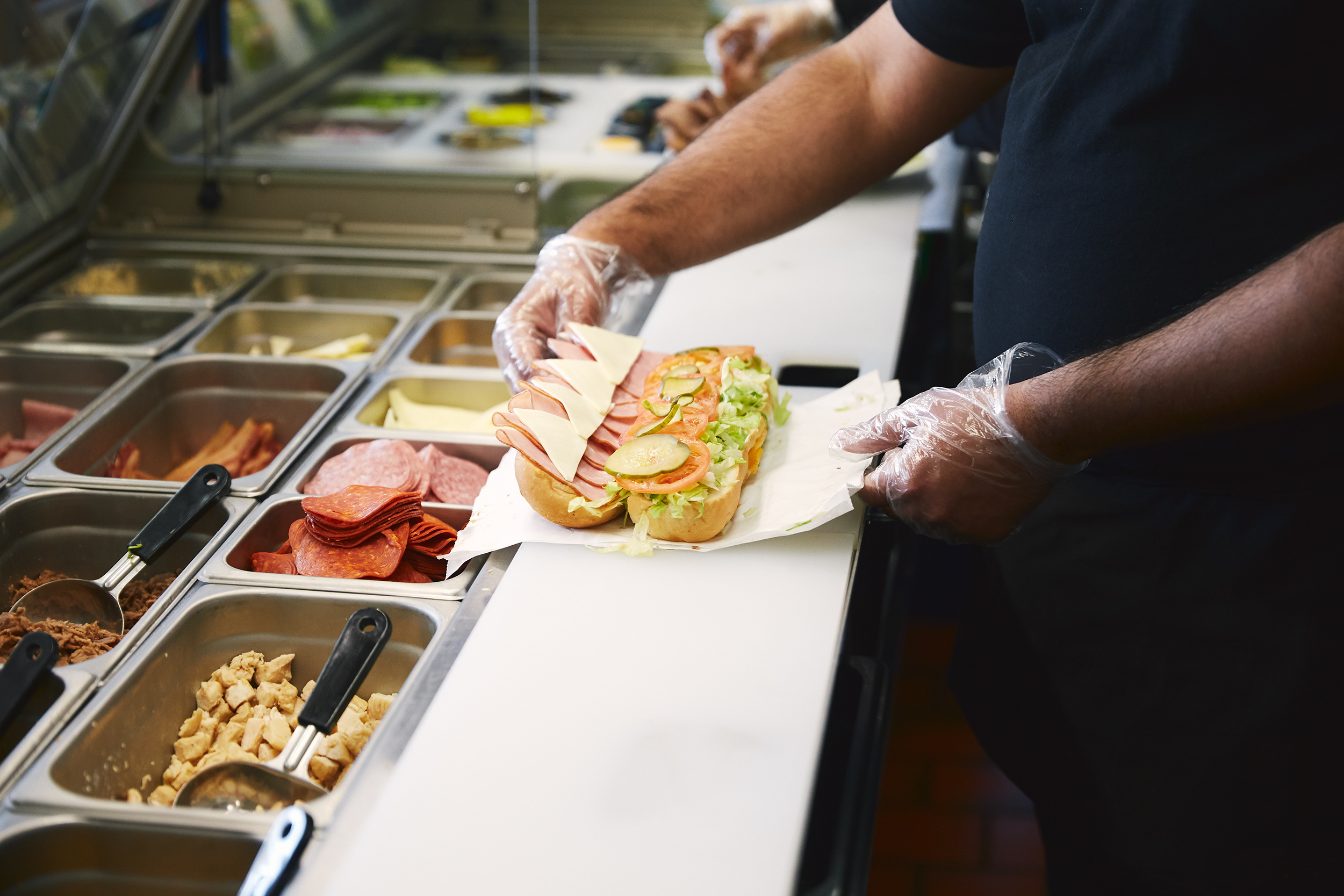 preparing sandwich in the fast food restaurant.