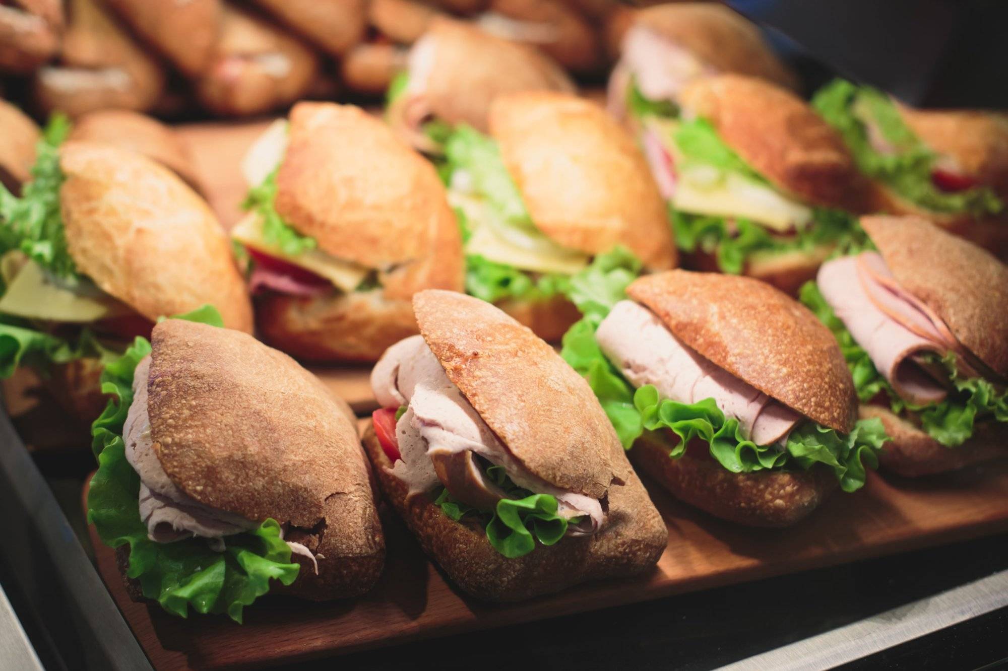 Beautifully decorated catering banquet table with sandwiches Beautifully decorated catering banquet table with sandwiches