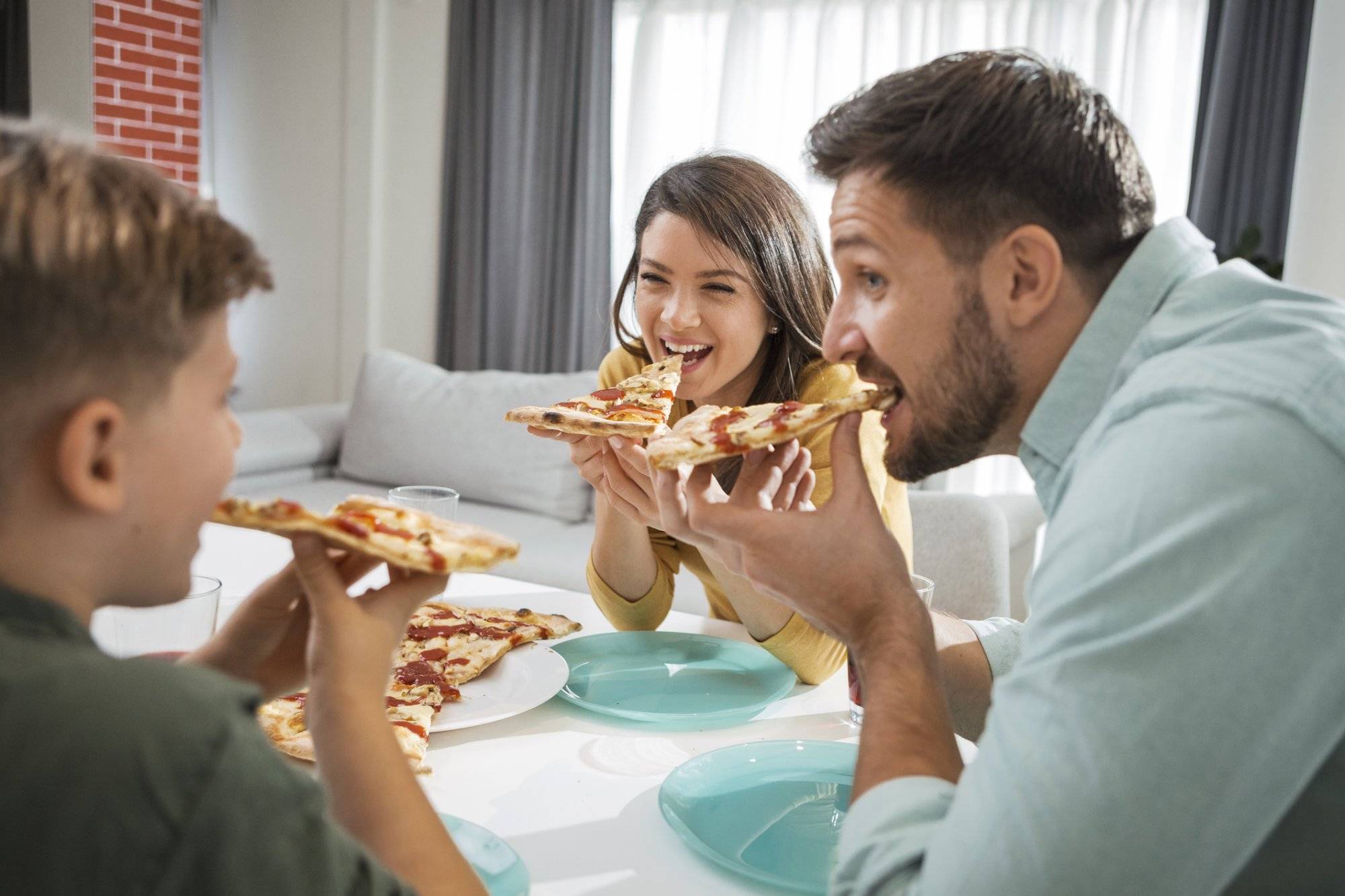 Family eating pizza Family eating pizza