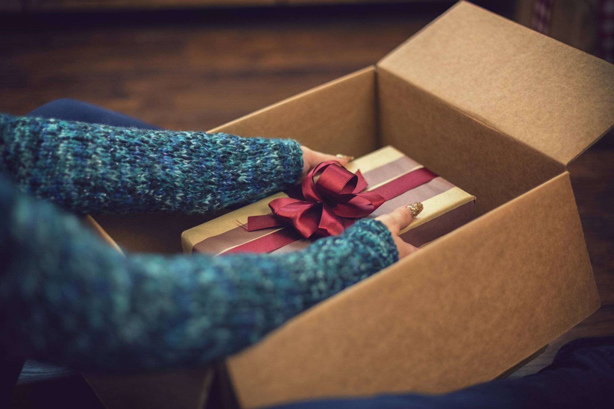 Young girl getting parcel on Christmas